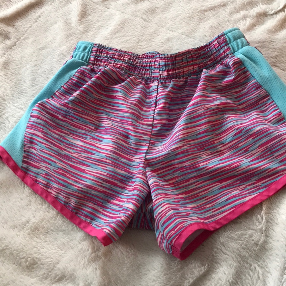 Blue and different colors of pink running shorts